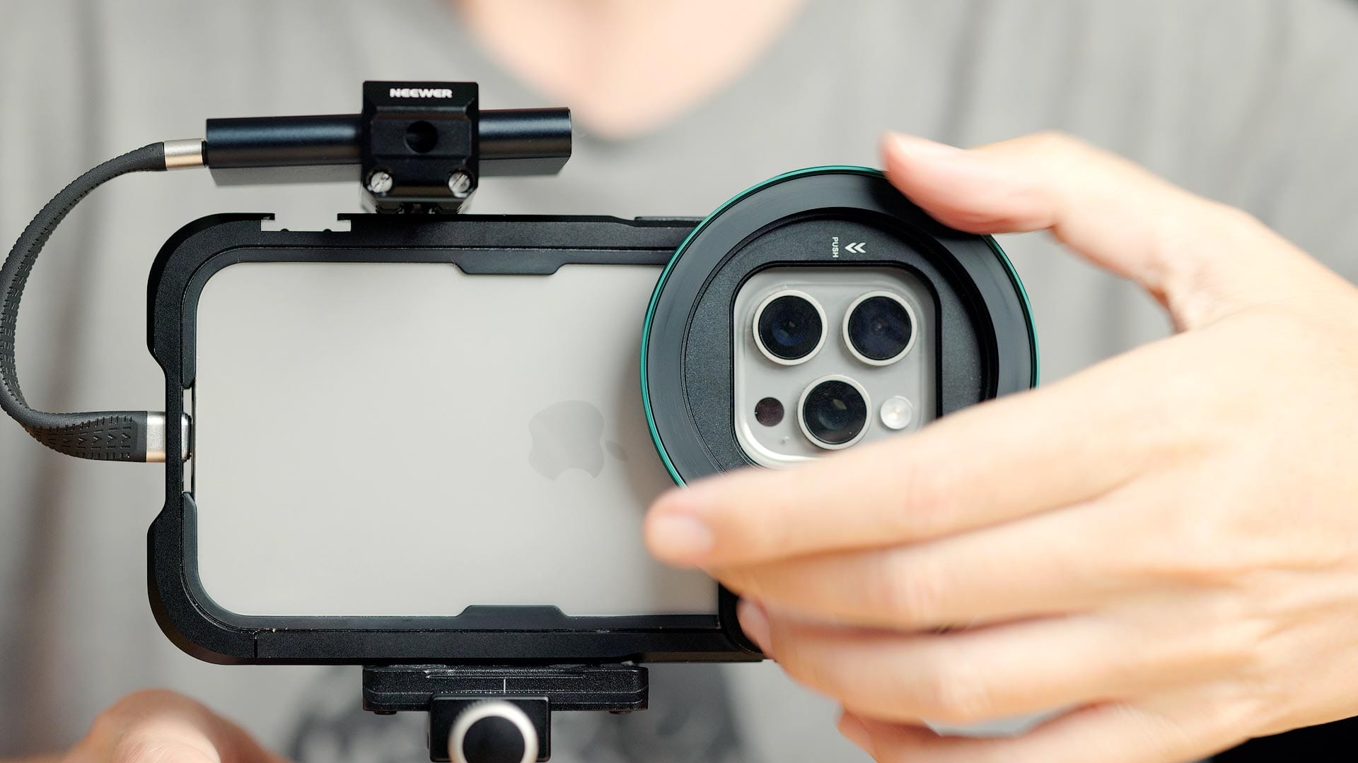 Mounting step-up ring to Neewer iPhone 15 Pro Max cage with circular filter adapter