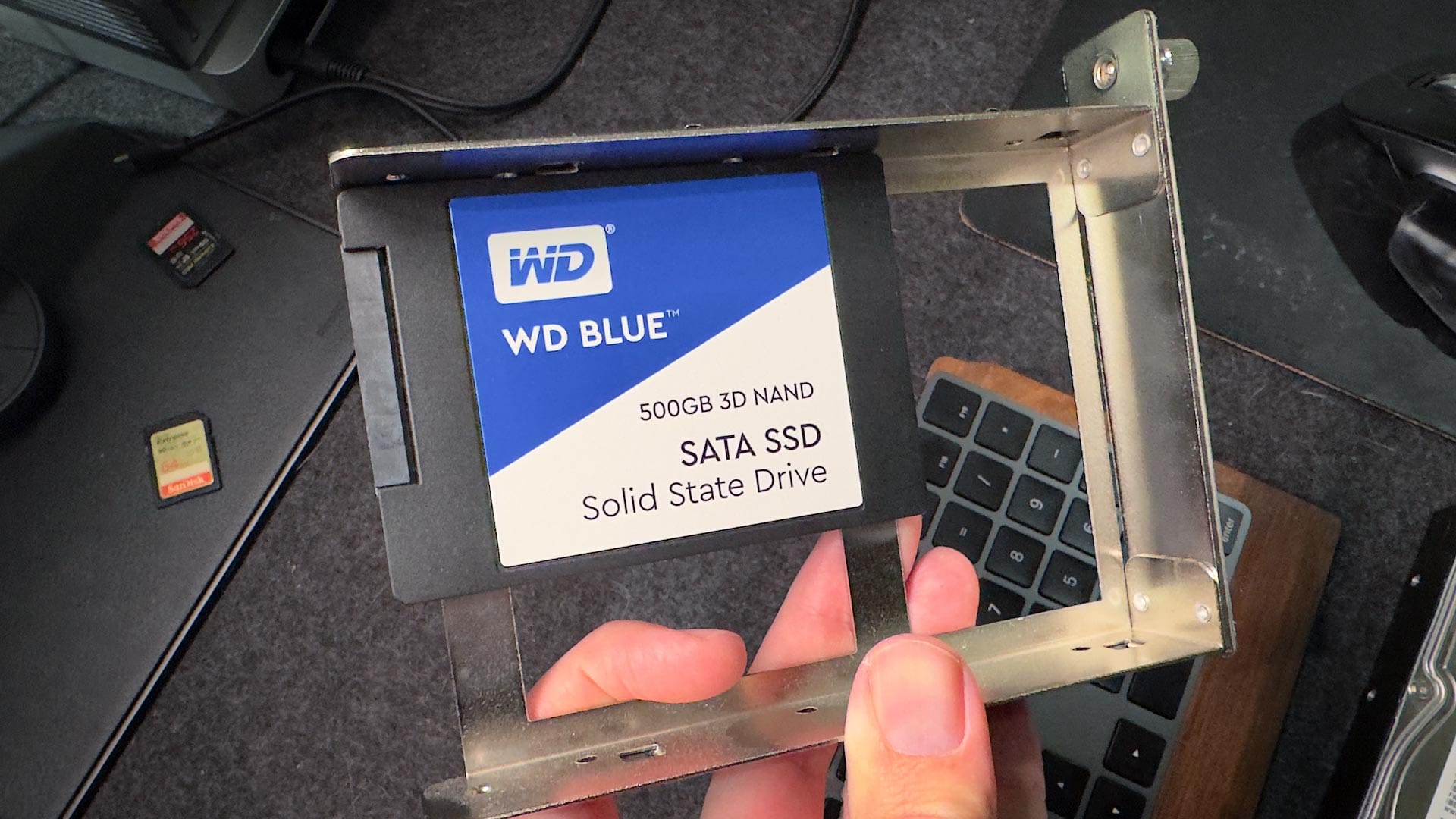 2.5" WD Blue SATA SSD drive mounted to ThunderBay 8 drive sled