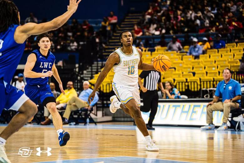 A basketball player dribbling a basketball

AI-generated content may be incorrect.