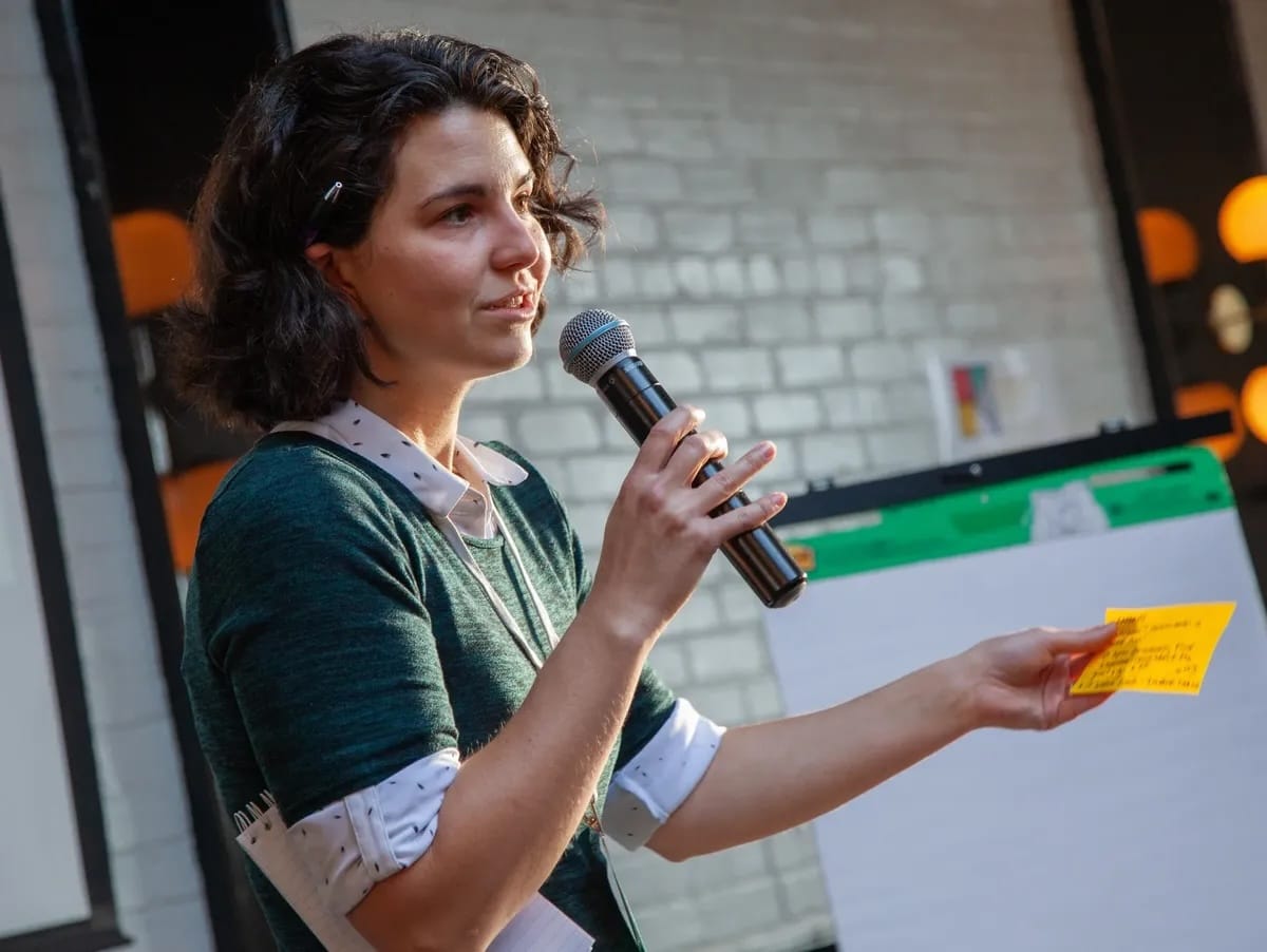 Woman holding a microphone