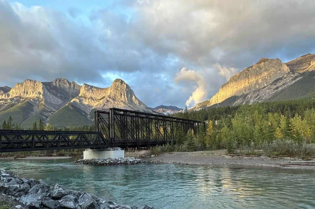 A Summer Sunrise From The Canmore Engine Bridge Alberta Canada