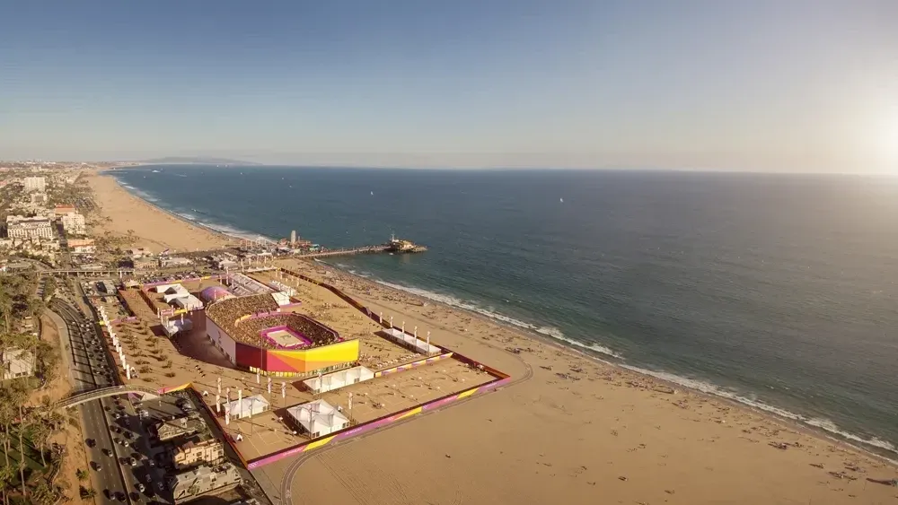 A rendering showing a large beach volleyball stadium on the beach by the Santa Monica Pier