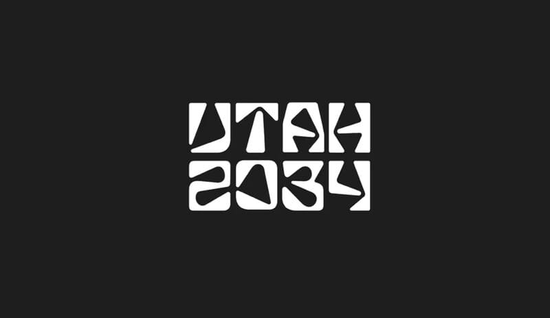 The UTAH 2034 logo in high contrast black and white with blocky type and an A that looks like the natural arch Delicate Arch
