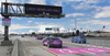 A rendering of a freeway with two lanes in purple paint that read LA28, the signboard also says LA28 vehicles only