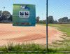 A baseball diamond and sign for PLAY LA, made possible by LA28 the Los Angeles 2028 Olympic & Paralympic Games