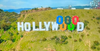 The Hollywood sign shown with five Olympic rings superimposed above the O's during the Olympics closing ceremonies