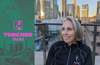 A pink and green Torched Talks graphic showing the LA skyline and Torched logo next to an image of Candace Cable, a white woman with blue eyes and a short blonde bob on a downtown LA rooftop