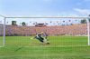 A dramatic goal being kicked in the World Cup final in a packed Rose Bowl stadium branded World Cup USA 94