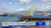 A KTLA screen grab showing the Santa Monica pier and a headline Ocean Way Festival canceled over beach erosion