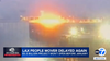 A video that's supposedly LAX's people mover with a large fire on the tracks and the chyron LAX people mover delayed again