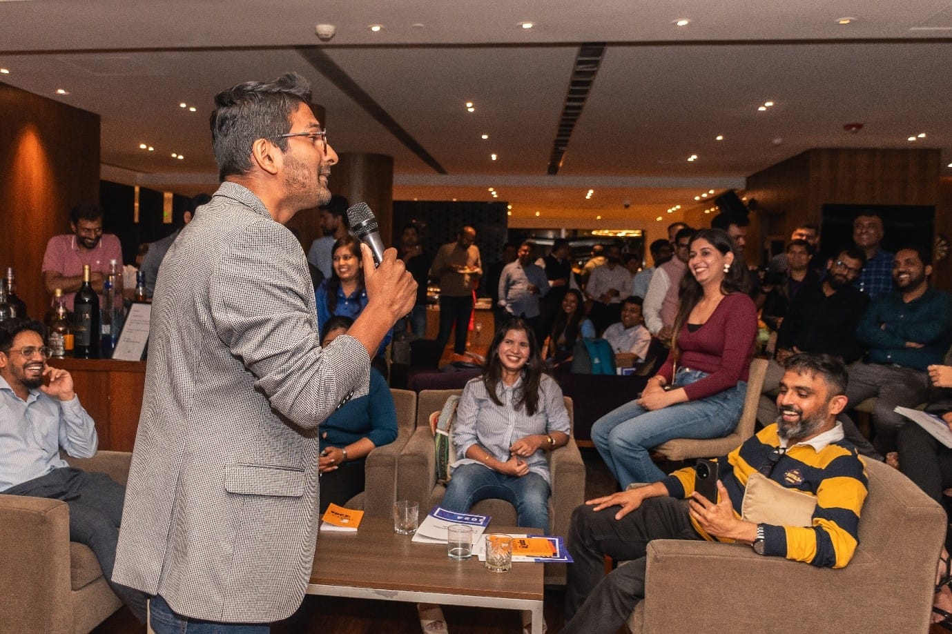 A person speaking into a microphone