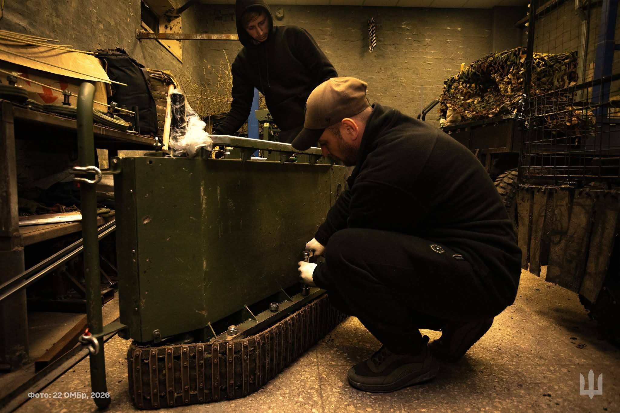 Ukrainian soldier building a "Droid" ground-attack drone
