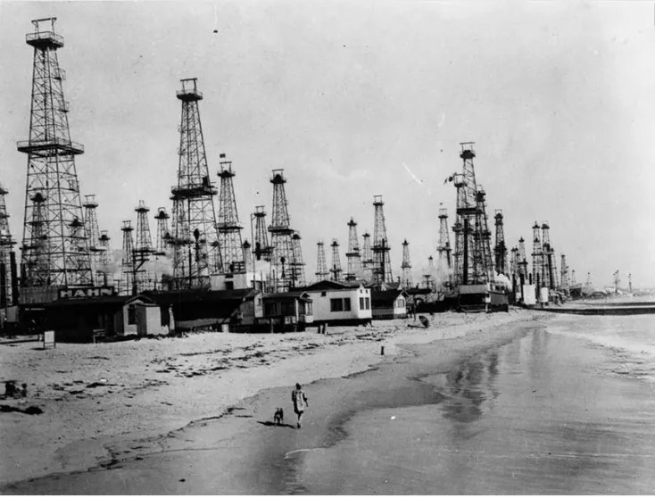Oil derricks along the beach in Venice, California, 1920s. 