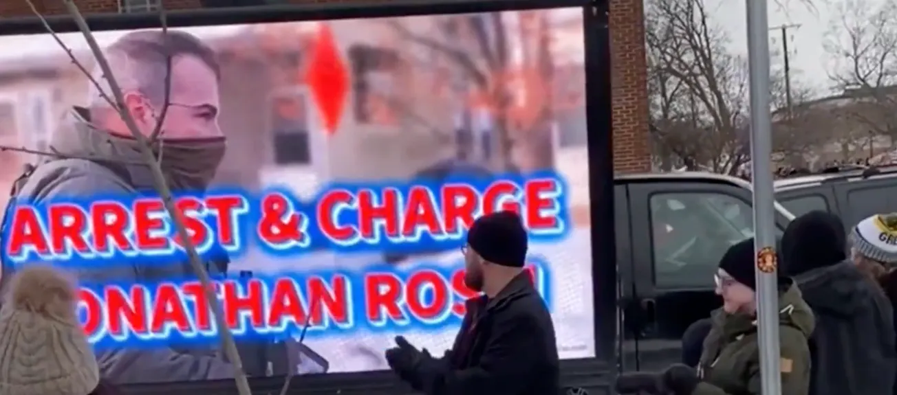 Mobile billboard calling for the arrest of ICE agent Johnathan Ross