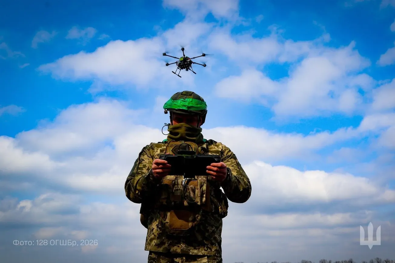 Ukrainian soldier operating a hexacopter drone