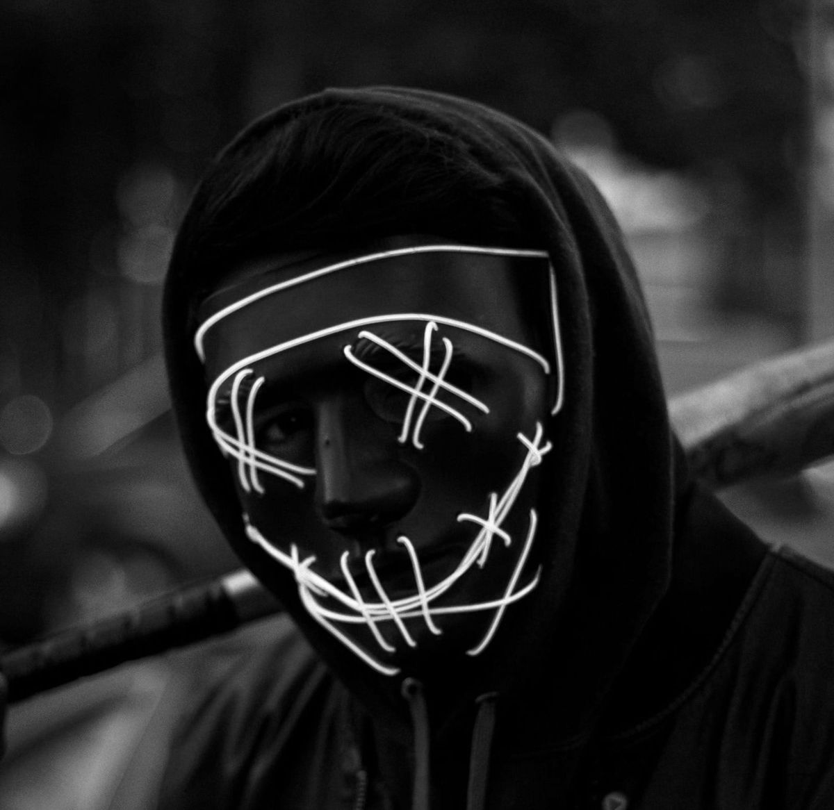 The Imperative of the Faceless: Anonymity, Biometrics, and Free Expression in 2025