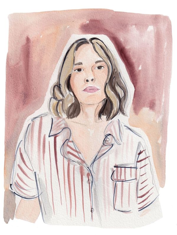 A watercolor painting of Aubrey Hirsch, a white woman with short, blonde wavy hair. She stares straight at us. She wears a short-sleeved red and white striped blouse.