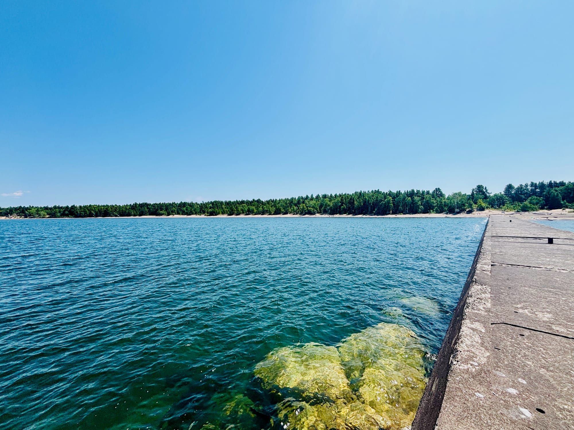 View of the beach from the Keweenaw Waterway Upper Entrance Light at McClain State Park