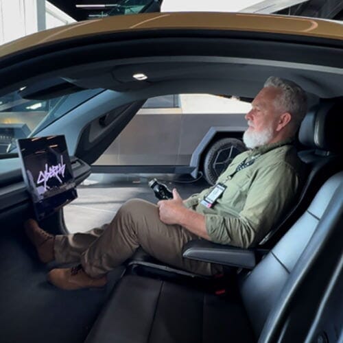 Man sitting inside a Tesla Cybercab