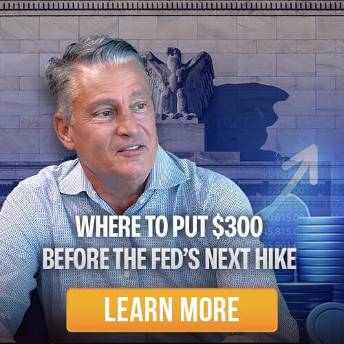Man in front of Federal Reserve background