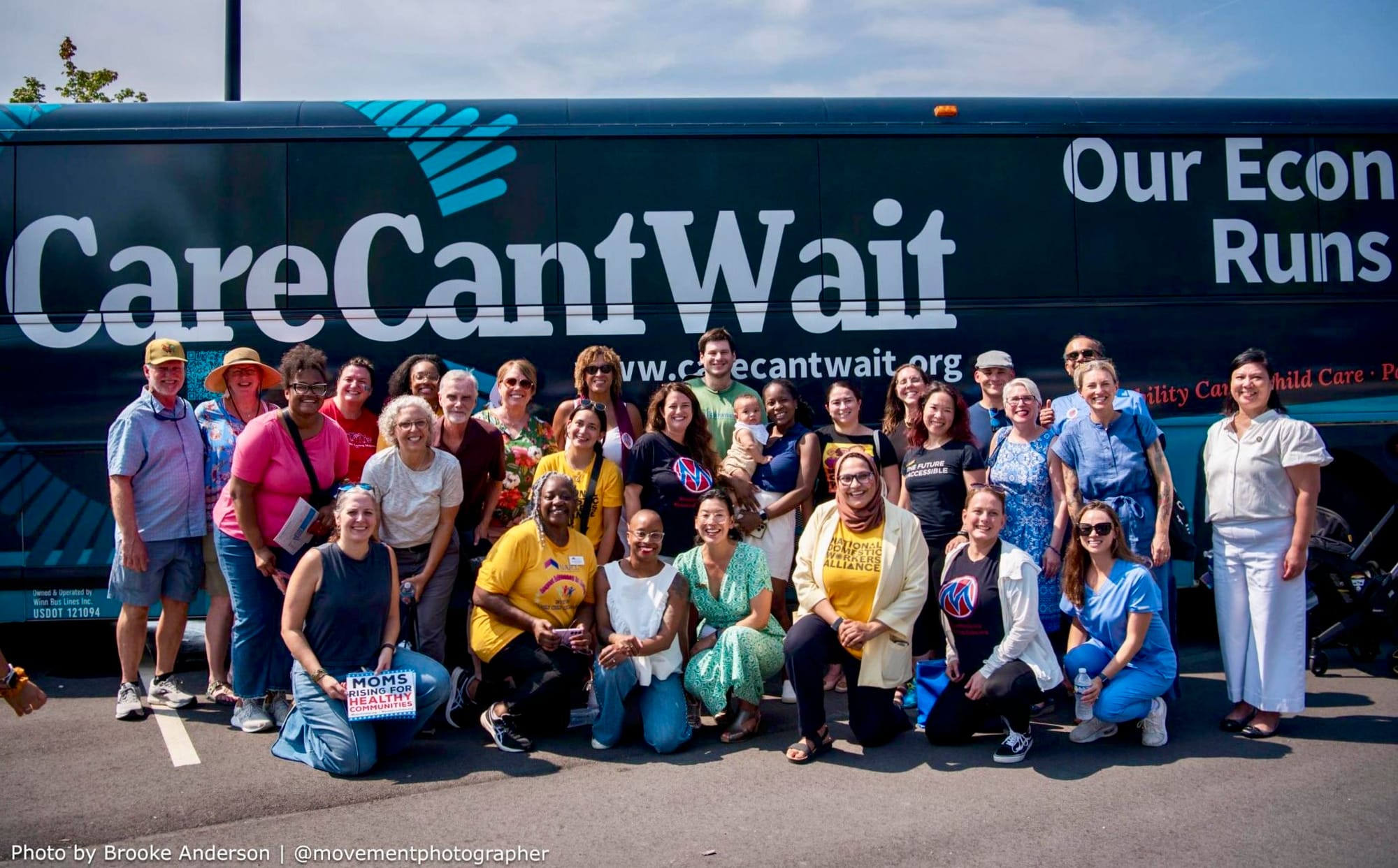 Group photo in front of the Care Can’t Wait bus in Raleigh, NC.