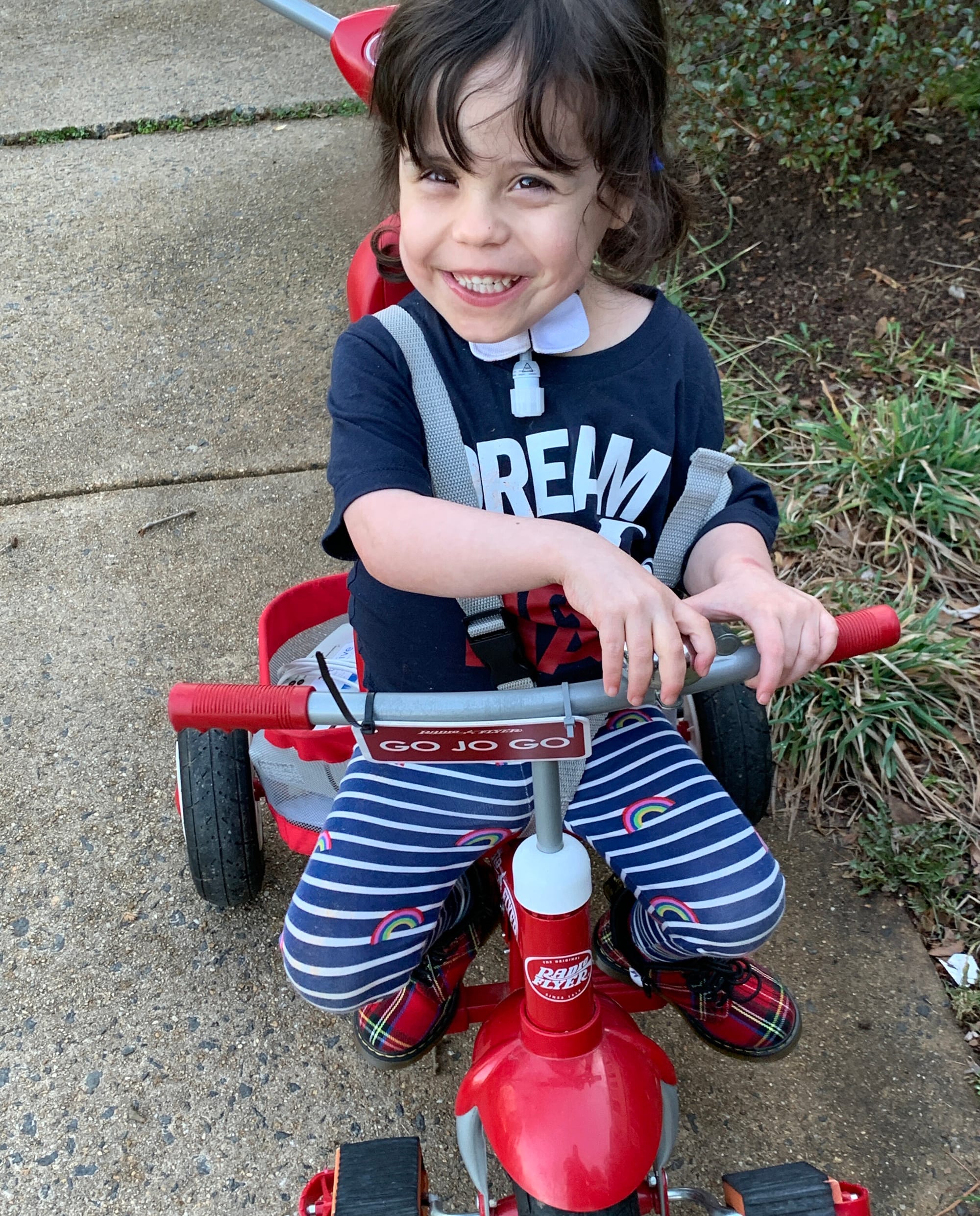 Josephine riding her bike.