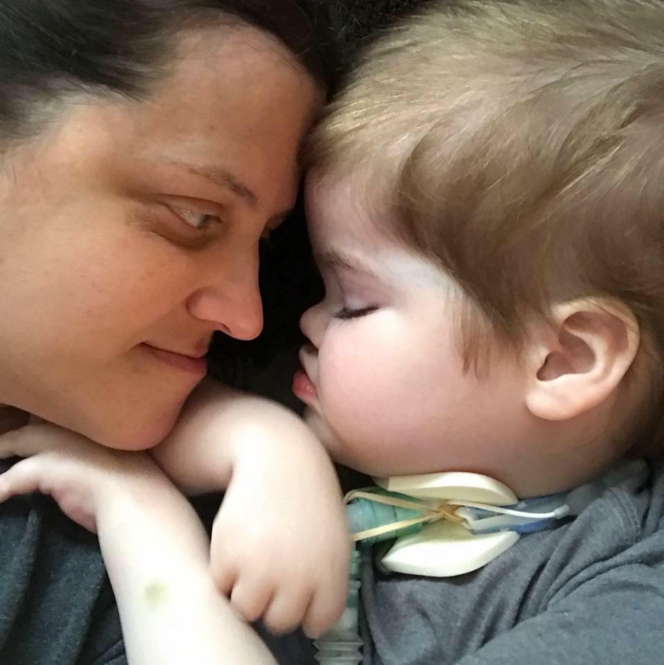 Image description: Tonya (the author) and her son Colton embracing nose to nose.