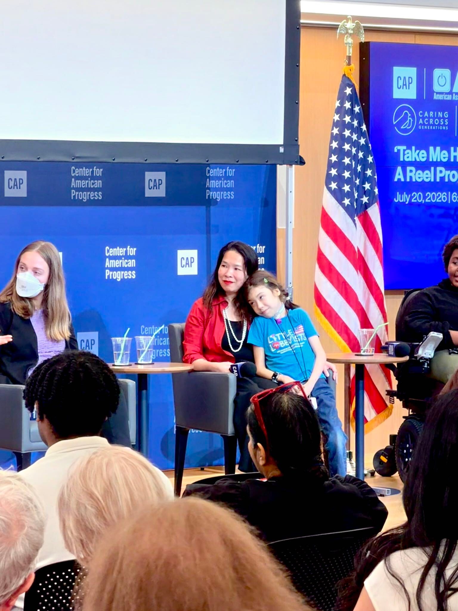 Xiomara of Little Lobbyists with her mom, Elena Hung, speaking at an event.