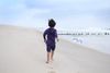 Ethan running down a beach