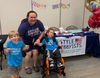Peter, Zachary, and Lisa celebrating Little Lobbyists' ninth birthday.
