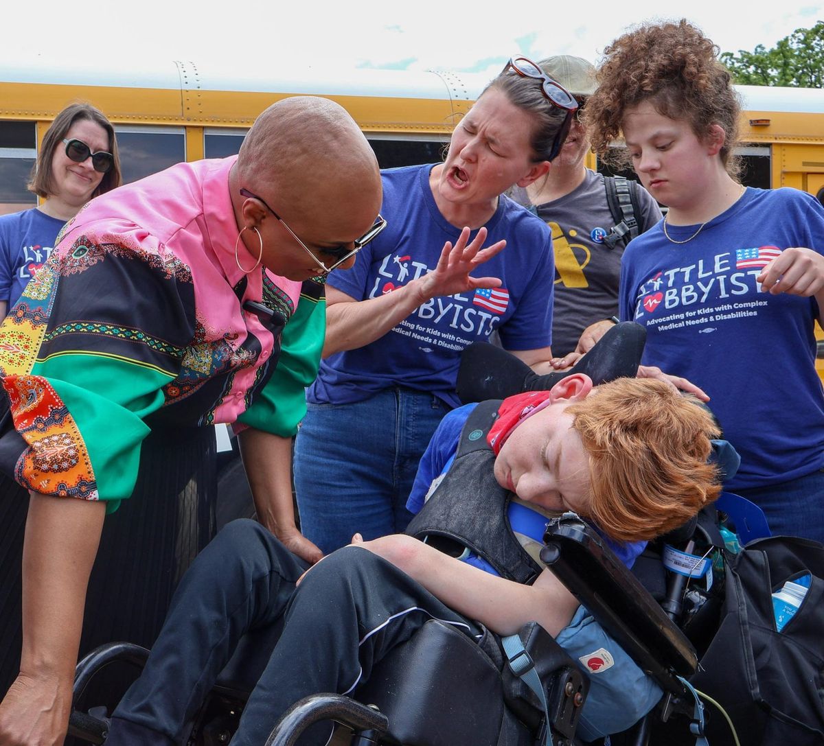 Meghann Luczkowski, Congresswoman Ayanna Pressley, Laura Robeson, Danny Robeson, and Nori Childers at a Medicaid vigil.