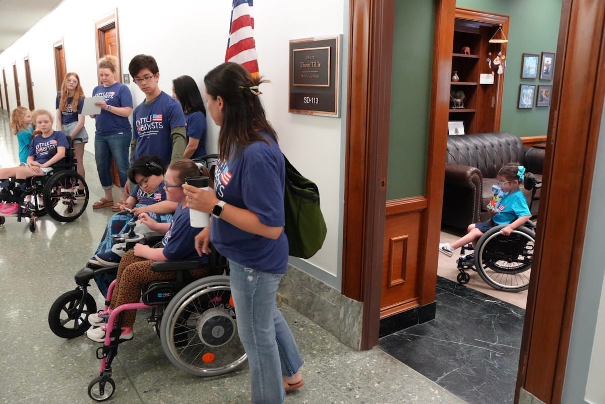 Medically complex children and families outside the office of Thom Tillis.