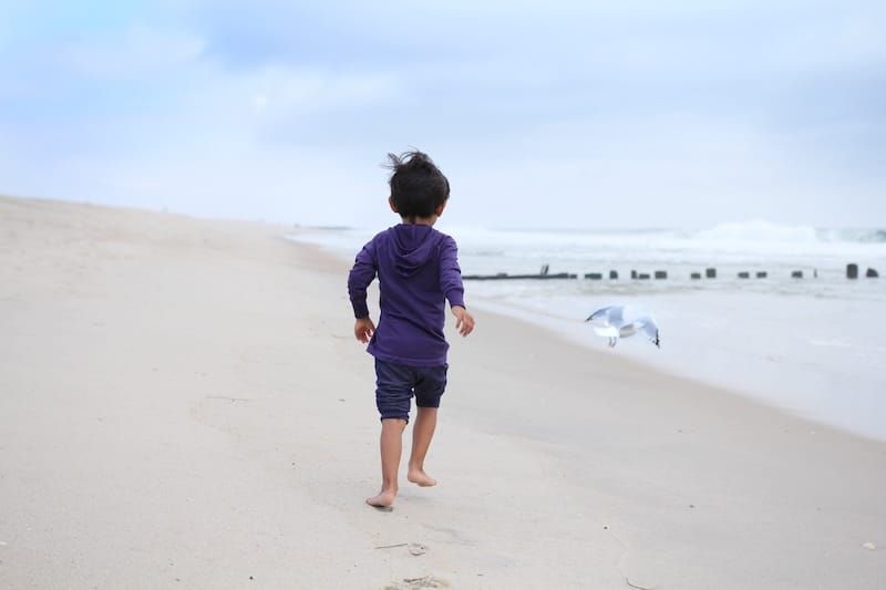 Ethan running down a beach