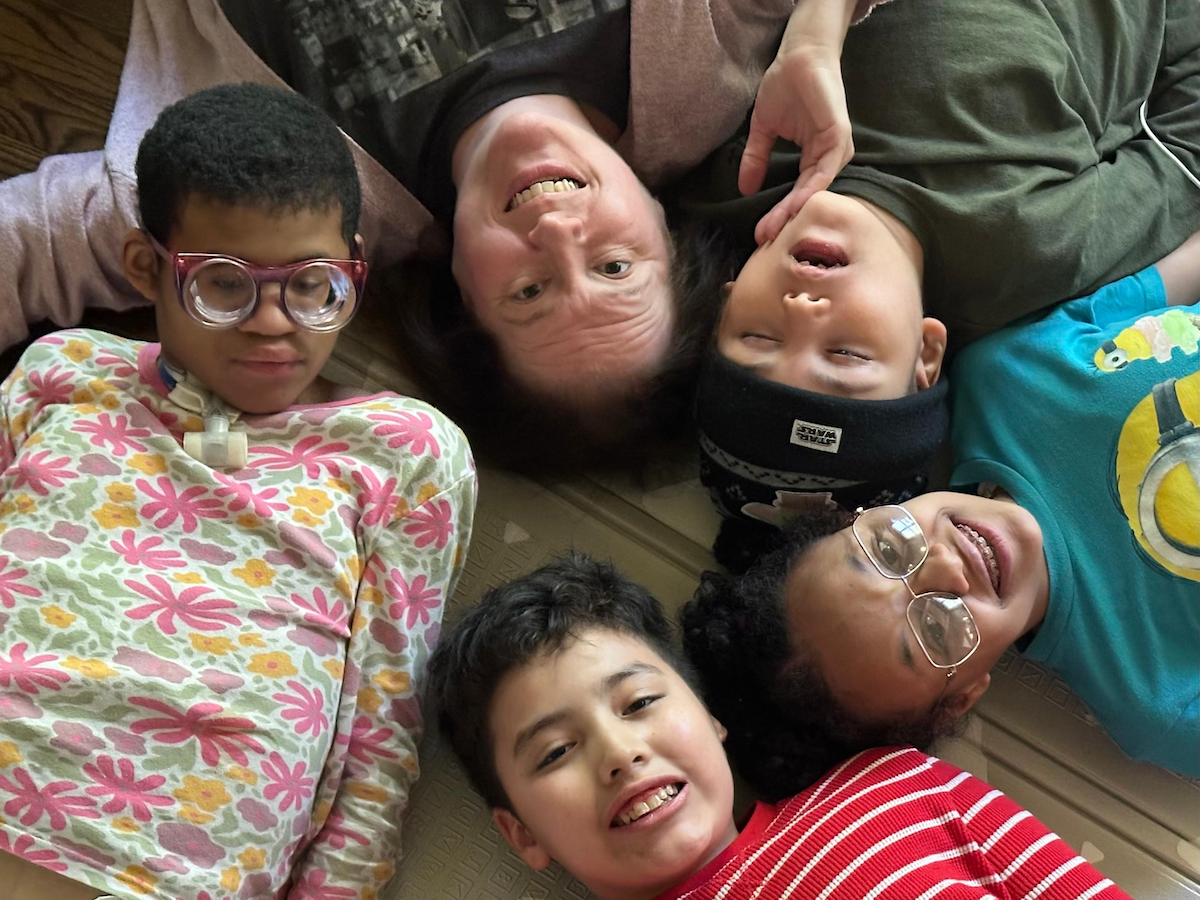 All the members of the Jolly family smiling in a group photo