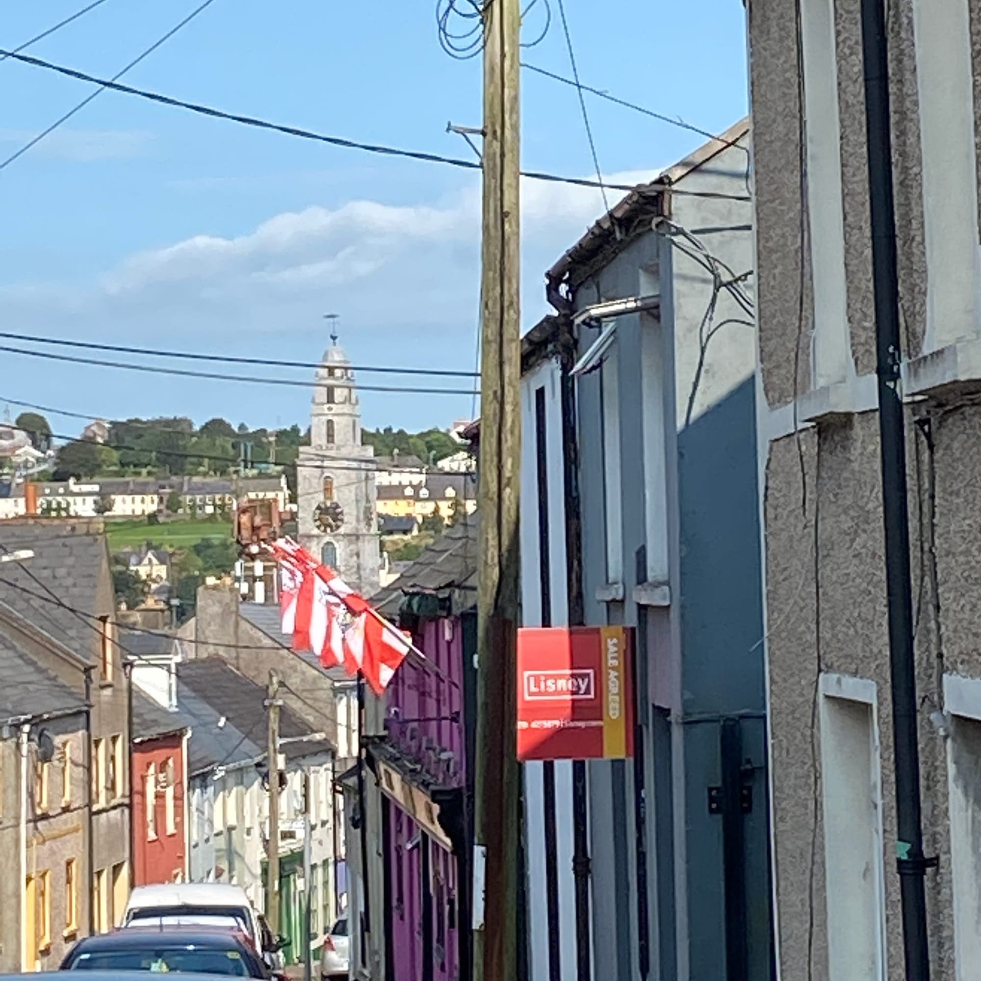 The view of Cork City looking at Shandon Tower and multiple County Cork red and white flags flown