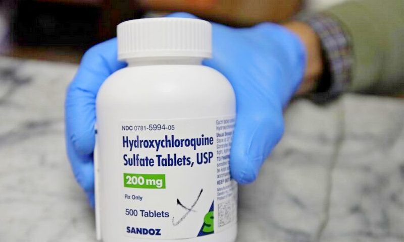 A pharmacist shows a bottle of the drug hydroxychloroquine in Oakland, Calif., on April 6, 2020. (Ben Margot/AP Photo)