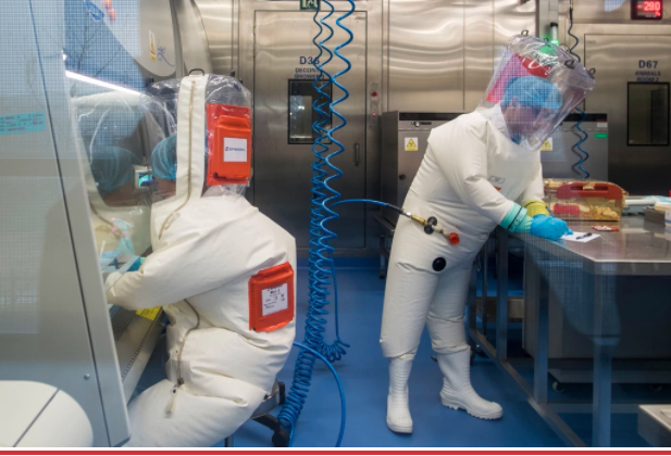 Scientists work inside the P4 laboratory in Wuhan.