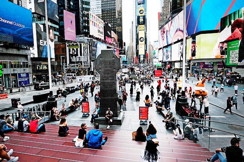 People spend an evening in Times Square as Broadway shows reopen in New York City on Sept. 14, 2021. (Spencer Platt/Getty Images)
