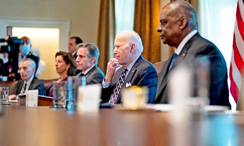 (L-R) U.S. Ambassador to Colombia Philip Goldberg, Commerce Secretary Gina Raimondo, Secretary of State Antony Blinken, President Joe Biden, and Defense Secretary Lloyd Austin meet with Colombian President Ivan Duque at the White House on March 10, 2022. The leaders spoke about recent meetings between the U.S. and Venezuela, where the possibility of easing U.S. oil sanctions on Venezuela were discussed after Biden had banned Russian oil imports to the U.S. (Doug Mills/Pool/Getty Images)