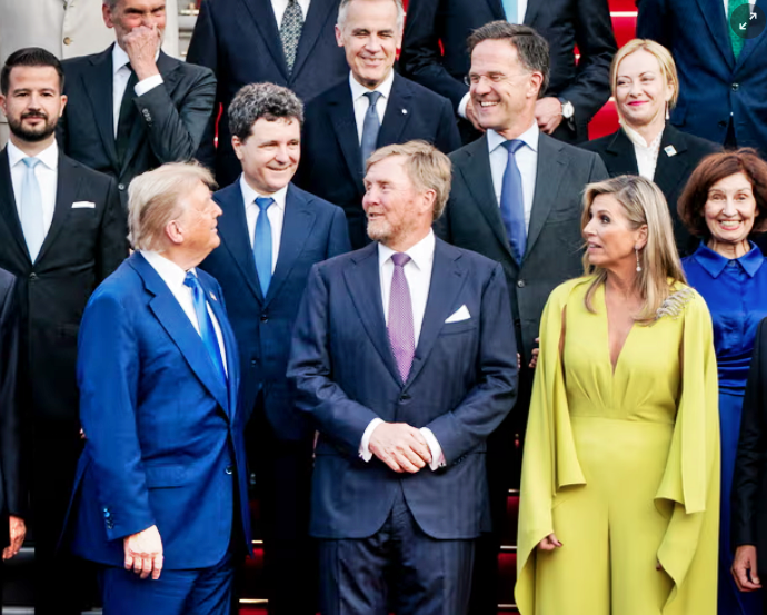 Trump casts doubt on commitment to defending Nato partners as he arrives in Europe for annual summit