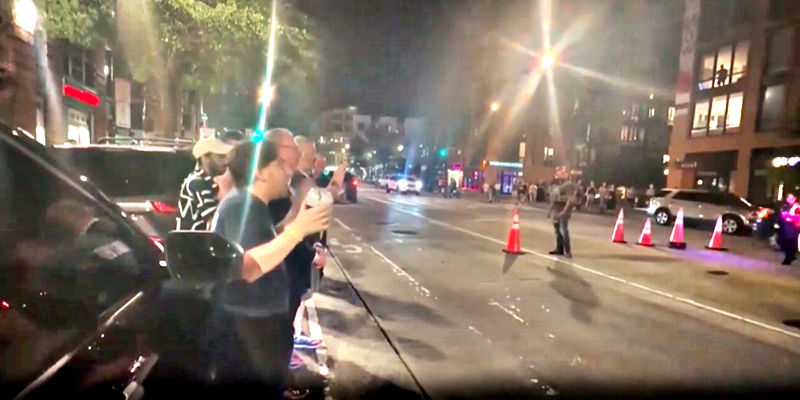 Police in DC get yelled at while setting up checkpoint along popular nightlife corridor