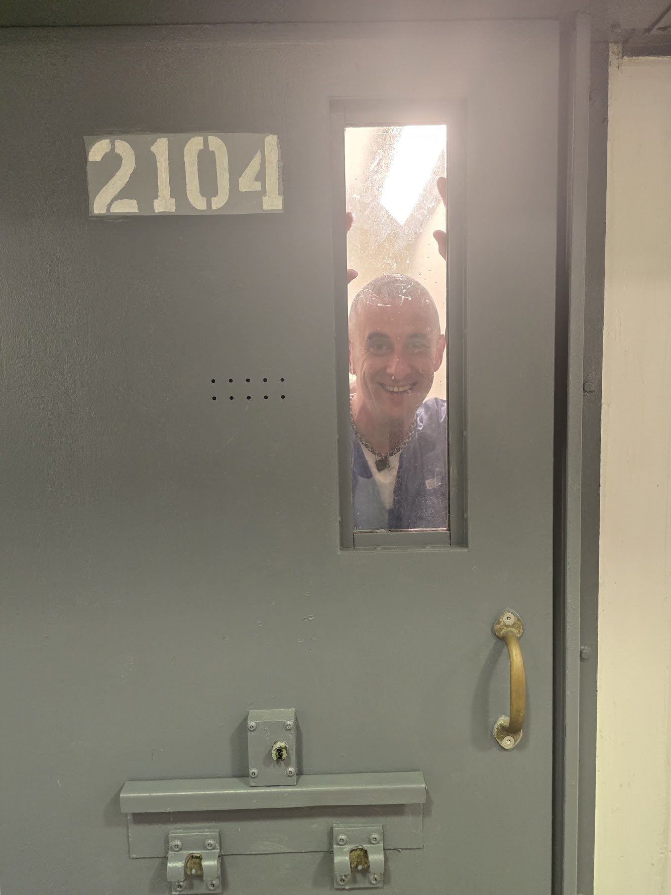 Mikey Looking Out From Cell 2104