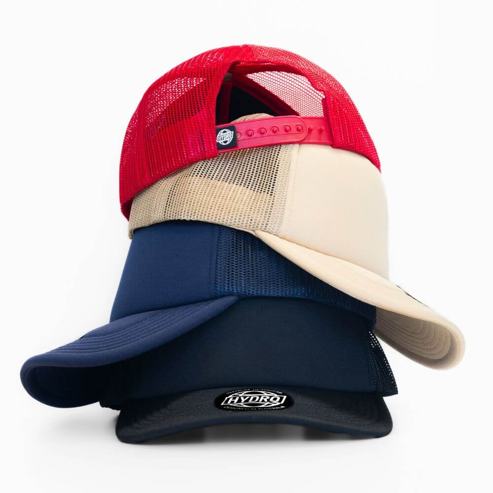 Stack of hats red white blue and black
