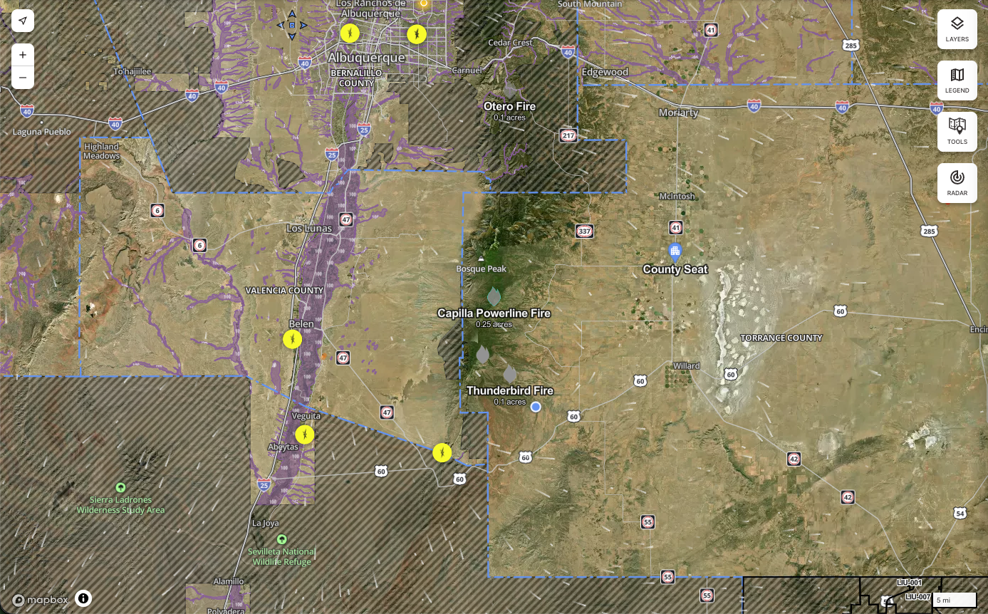 Map screenshot showing wildfire activity across the Albuquerque metro, Valencia County and Torrance County, including markers for the Capilla Powerline Fire and Thunderbird Fire near Bosque P