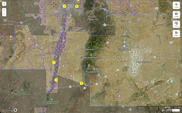Map screenshot showing wildfire activity across the Albuquerque metro, Valencia County and Torrance County, including markers for the Capilla Powerline Fire and Thunderbird Fire near Bosque P