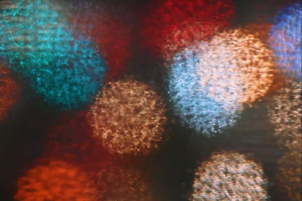 color street photography of bokeh lights at night