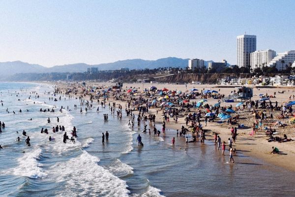 color street photography of crowded Santa Monica beach on a sunny day