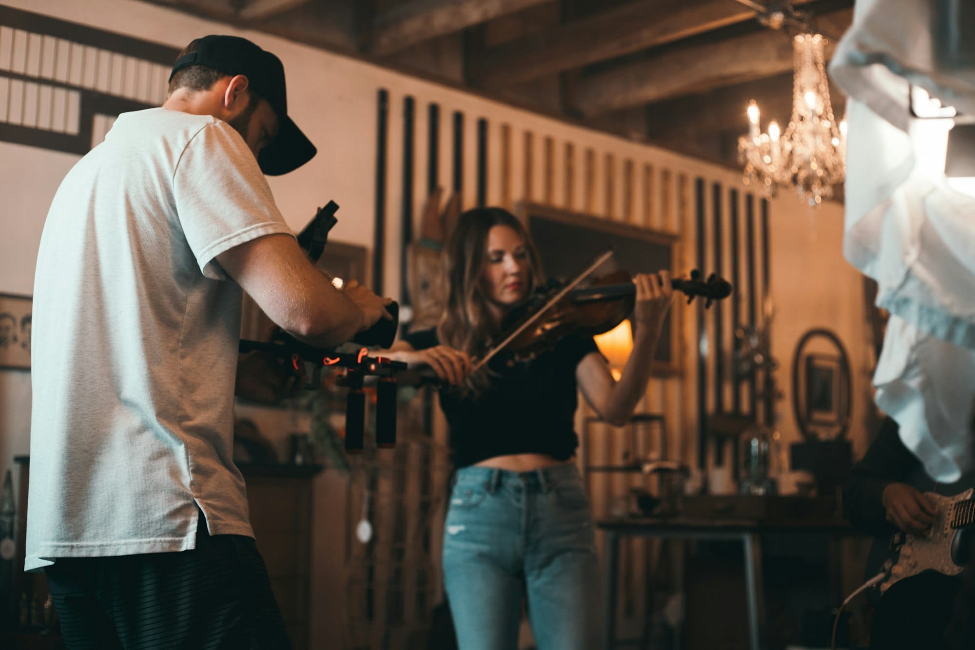 woman standing playing violin