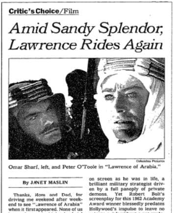 A clipping from the New York Times with the headline "Amid Sandy Splendor, Lawrence Rides Again" by Janet Maslin