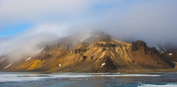 Ziegler Island in Franz Josef Land rises steeply out of the icy sea